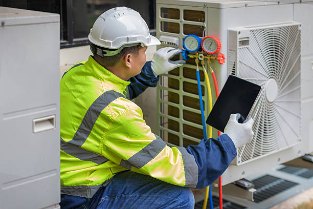 Professional Air Conditioning Repair technician working in Rhodes, IA